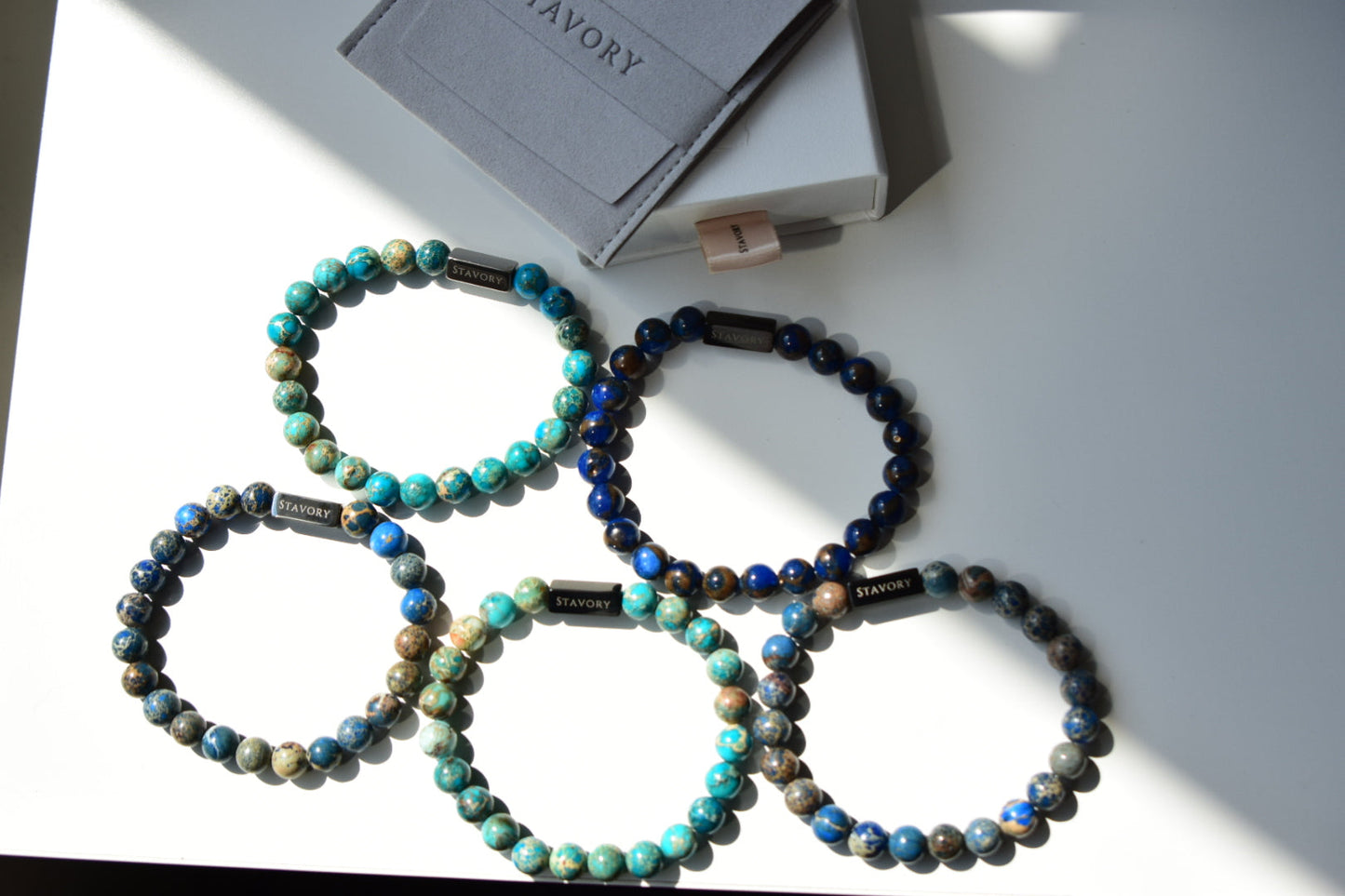 Stavory aqua imperial stone black bead prosperity bracelet